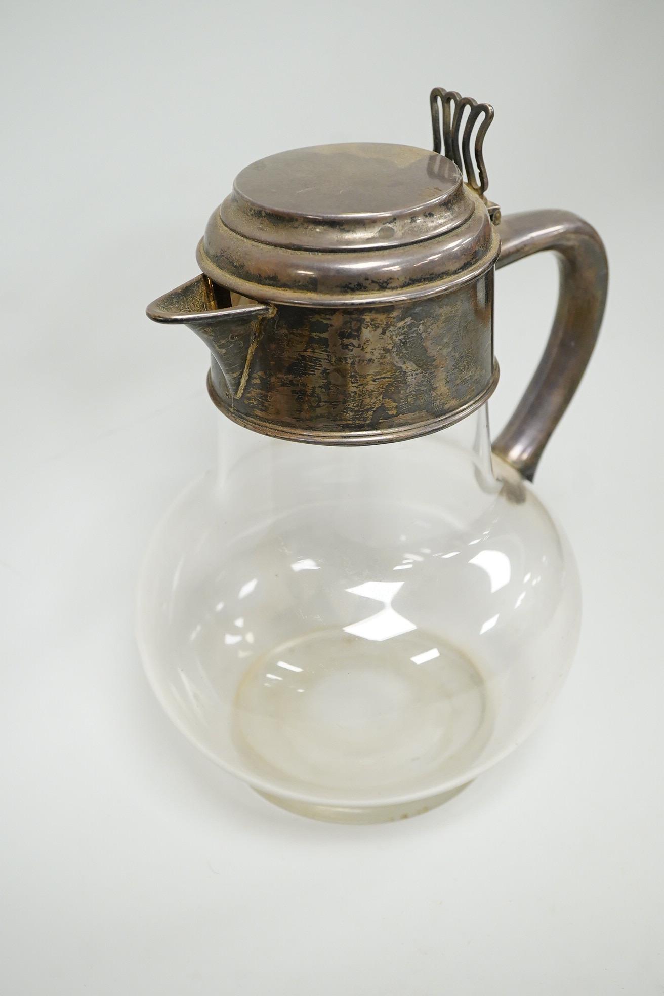 A late Victorian silver mounted plain glass bulbous claret jug, Richard Hodd & Son, London, 1880, height 19.7cm.